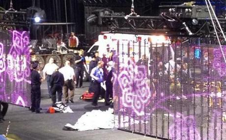 Emergency workers tended to injured performers after a platform collapsed during a circus performance in Providence.
