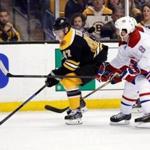 Torey Krug (left) has seen good puck movement on the power play, but the results aren’t there.; Greg M. Cooper USA Today
