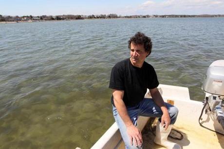Richard Cook has battled since 2011 to create an oyster harvesting site off Popponesset Island.
