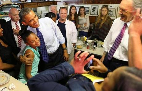 President Obama posed for a photo at Charlie’s during an appearance with Edward Markey last year.
