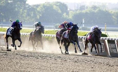 Tonalist crossed the finish line to win the 146th Running of the Belmont Stakes, spoiling California Chrome’s attempt at the Triple Crown.
