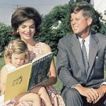 Caroline, Jacqueline, and John F. Kennedy, then a US senator, at Hyannis Port in 1960. 