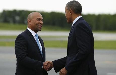  Obama was greeted by Governor Deval Patrick at the airport.
