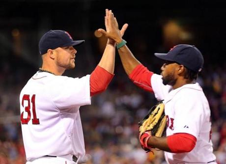 Jon Lester congratulated center fielder Jackie Bradley Jr. after his catch (and double play) in the seventh inning.
