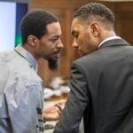 Brothers Domunique Grice (left) and Branden Mattier spoke to each other during their trial. 