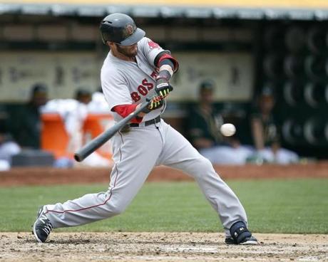 The line drives aren?t falling in right now, says Dustin Pedroia, but ?the storm?s coming.? AP Photo/Tony Avelar
