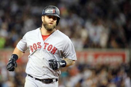 Mike Napoli rounded the bases after hitting a home run in the ninth inning at Yankee Stadium.
