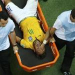 Neymar grimaced as he was carried off the field.
