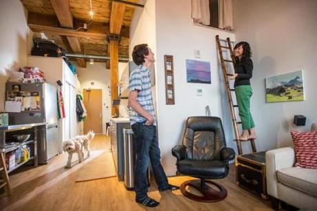 Matthew Knoll shares 451 square feet of living space with his girlfriend, Emily Wu, and their dog, Maui.
