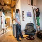 Matthew Knoll shares 451 square feet of living space with his girlfriend, Emily Wu, and their dog, Maui.