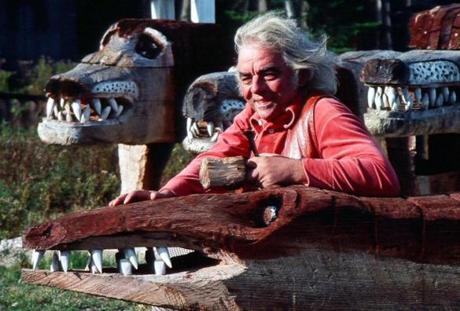 Bernard Langlais in 1976 with his wooden sculptures in Cushing, Maine.
