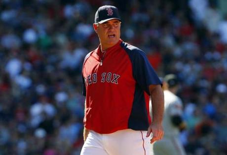 Boston Red Sox manager John Farrell has a World Series in his pocket, but the defense of that title has but anything but easy.
