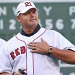 Roger Clemens patted his chest to cheering fans during a ceremony at Fenway Park last year.