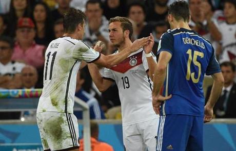 Mario Goetze (center), pictured earlier in the game, put Germany on the board in the 113th minute.
