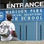 Students hung out near the entrance to Madison Park Technical Vocational High School in Roxbury.