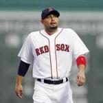 Shane Victorino warms up before Saturday night?s game against the Royals, his return to the Red Sox lineup. Michael Dwyer/Associated Press