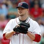 Jon Lester threw eight shutout innings to lead the Red Sox to a win on Sunday.