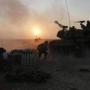 An Israeli mobile artillery unit fired towards the Gaza Strip Monday.