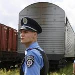 A Ukrainian policeman watched as a train carrying the remains of the victims of Malaysia Airlines MH 17.