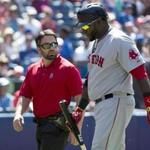 David Ortiz left the field with a trainer after he was unable to finish his final at-bat Thursday. He is day-to-day with back spasms.