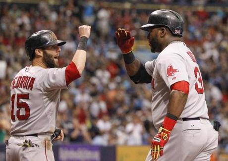 David Ortiz was congratulated by Dustin Pedroia after hitting a three-run homer in the third inning.
