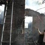 A house was severely damaged in rebel-held Horlivka, which was encircled by government troops on Sunday.