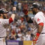 David Ortiz was congratulated by Dustin Pedroia after hitting a three-run homer in the third inning.