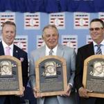 Tom Glavine(left)  was ushered into the Hall of Fame along with Braves teammate Greg Maddux (right) and their manager for many seasons in Atlanta, Bobby Cox.  (Mike Groll/Associated Press)