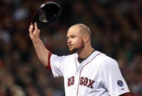 Jon Lester led the Red Sox to World Series glory last fall, helping Boston top the Cardinals in six games.
