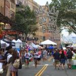 Tourists and residents walked along Hanover Street in Boston?s North End Friday during the St. Agrippina di Mineo festival.