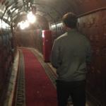 Tour guide Fyodor Belousov moved through a corridor in the Cold War museum at Bunker-42 on Taganka, located in a secret Cold War-era underground bunker that was designed to withstand a nuclear attack on Moscow. 