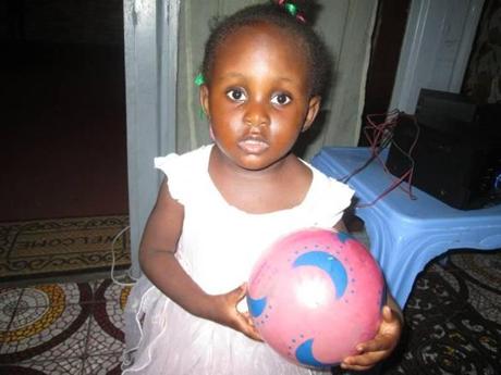 Timm and Jennifer Runnion have adopted Isilie, now 2, but cannot bring her home from the Democratic Republic of Congo.
