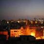 Fire is seen after an explosion in what witnesses said was an Israeli air strike in Gaza City Sunday.