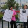 Jessica and Holly Pierce, a mother and daughter who both worked part-time at Market Basket in Gloucester, protested Wednesday.