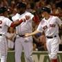 David Ortiz (center) celebrated with Yoenis Cespedes (left) and Brock Holt in the fifth inning.