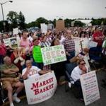 Market Basket customers held a rally outside of the Tewksbury store.