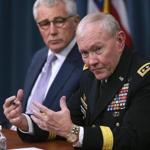 General Martin Dempsey (right) and Secretary of Defense Chuck Hagel discussed the Islamic State Thursday at the Pentagon. 