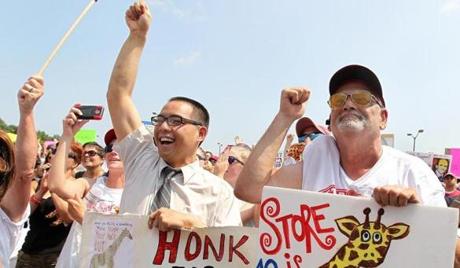 Market Basket employees and customers attend a rally in Tewksbury on Aug. 5.

