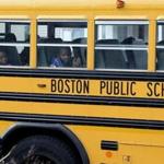 Students at the Up School rode on a school bus in Dorchester yesterday.