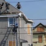 Repairs were underway on Wednesday to a house on Taft Street in Revere, but other residents were still negotiating with insurance companies following last month?s tornado.