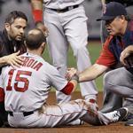 Dustin Pedroia was helped by trainer Brad Pearson (left) and John Farrell after an elbow to his head. Pedroia had concussion symptoms.