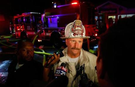 Fire Commissioner Joseph Finn gave a briefing at the scene.
