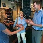 Seth Moulton chatted Wednesday in Salem with Meryl Sevinor (left) and Jeanette Ablow, both of Marblehead. 