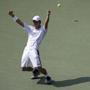 Kei Nishikori celebrates after defeating Novak Djokovic on Saturday.