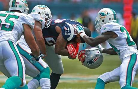 Patriots running back Stevan Ridley lost his helmet as he picked up some first quarter yardage. 
