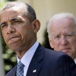 File photo of President Barack Obama, accompanied by Vice President Joe Biden.
