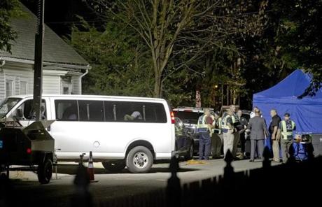 Blackstone, MA 9/11/2014 The crime scene on St. Paul Street where investigators are investigating a home (behind trees next to blue tents) after they discovered the remains of 3 children on Thursday September 11, 2014. (Matthew J. Lee/Globe staff) Topic: Reporter: 

