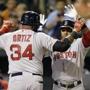 David Ortiz and Yoenis Cespedes (rear) hit back-to-back home runs in the fourth inning. Ortiz later added a two-run homer in the 10th inning. (AP Photo/Patrick Semansky)