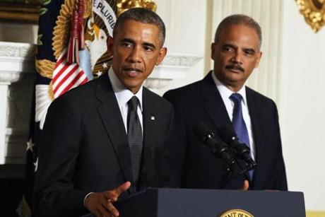President Obama stood with Attorney General Eric H. Holder at his resignation.
