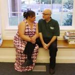 Laura Sanscartier, with her husband, Paul, has bipolar disorder and works nights at the library in Dracut.